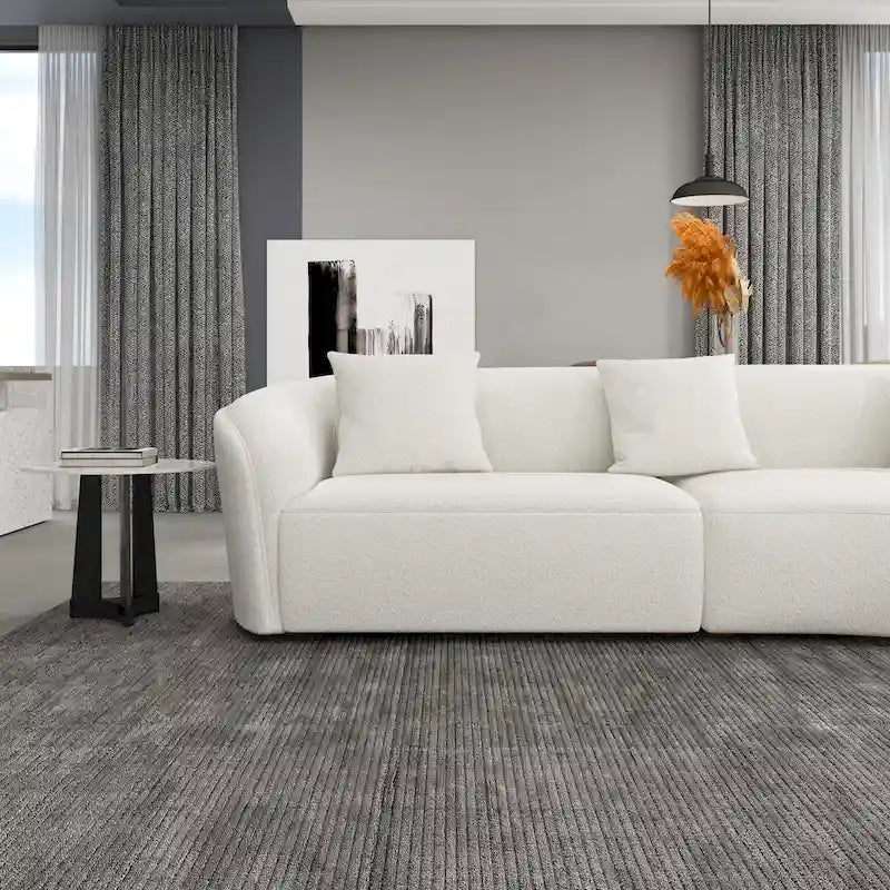Canapé incurvé en tissu bouclé Gallar, style Japandi, luxe moderne français