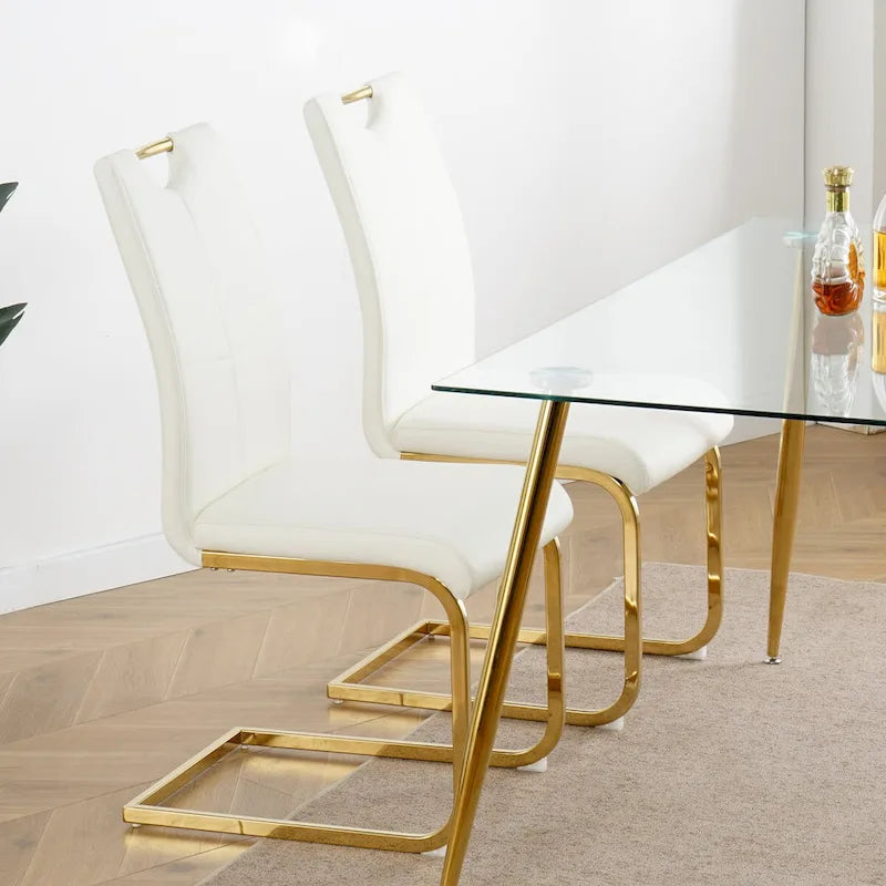 Chaises de salle à manger modernes en similicuir rembourrées avec pieds en métal doré, lot de 2